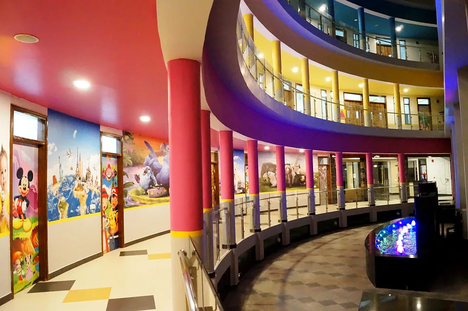 Curved corridor and murals